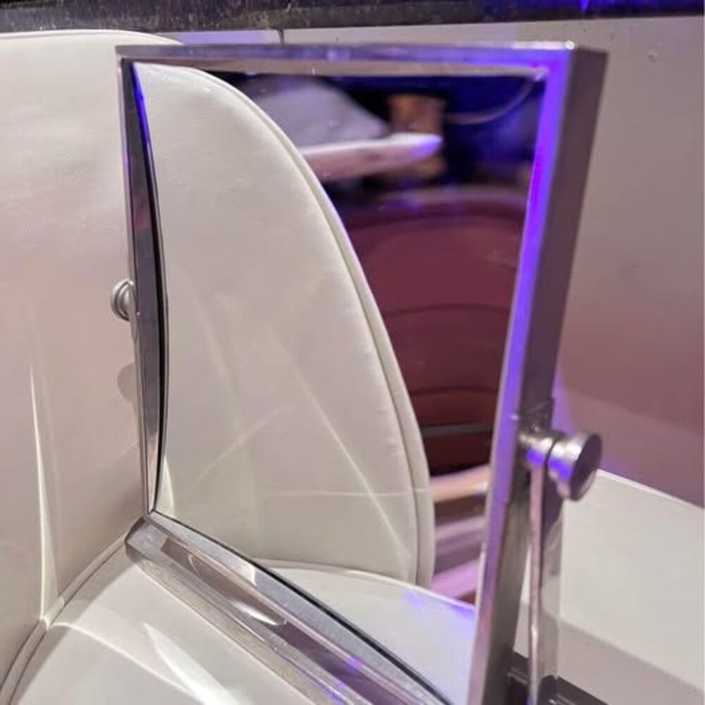 Double sided display mirror, very heavy Beveled glass one side magnifying on sec